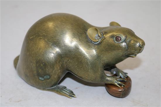 A Japanese gilt patinated bronze model of a rat with a nut, late 19th century, length 18cm